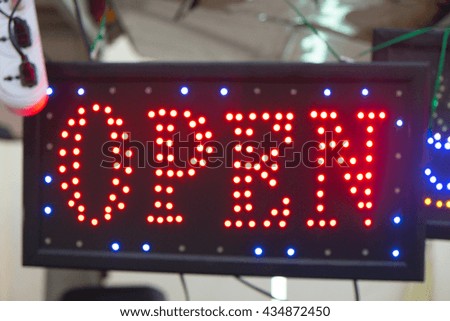 Neon Open Sign - red neon open sign hanging
