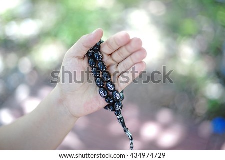 Hand of muslim people with praying gesture. selective focus