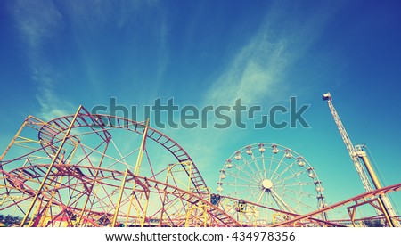 Vintage toned picture of an amusement park.