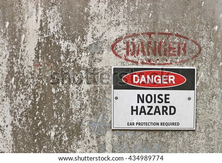 red, black and white Danger, Noise Hazard warning sign Royalty-Free Stock Photo #434989774