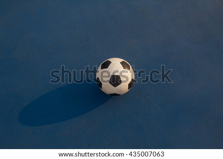 football on blue background , futsal on blue ground