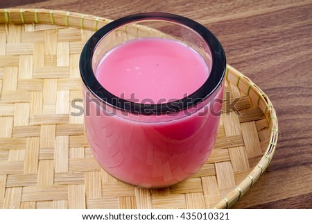Fresh rose milk drink. Selective focus and copy space.