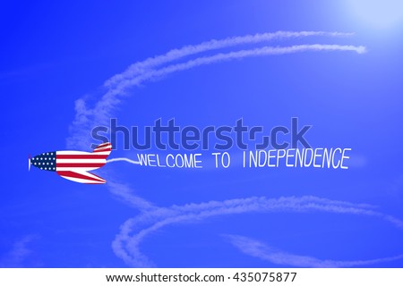plane pulling an invitation in the colors of the American flag