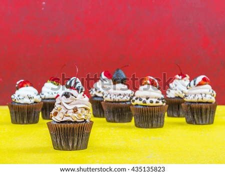Chocolate Cupcakes on wood vintage background (Selective Focus)
