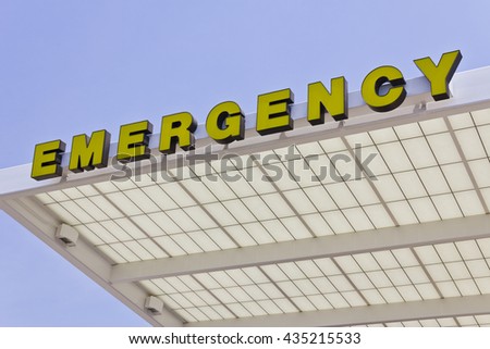 Yellow Emergency Entrance Sign for a Local Hospital VI