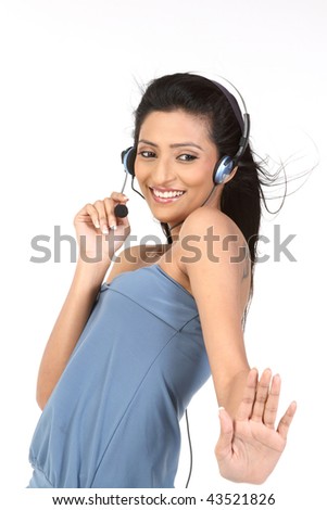Young customer service agent with headset on against a white background