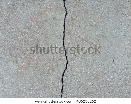 Dirty dark concrete crack floor texture background