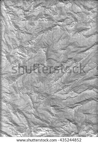 Grunge dotted paper vector background.