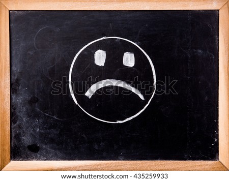 cry icon on blackboard