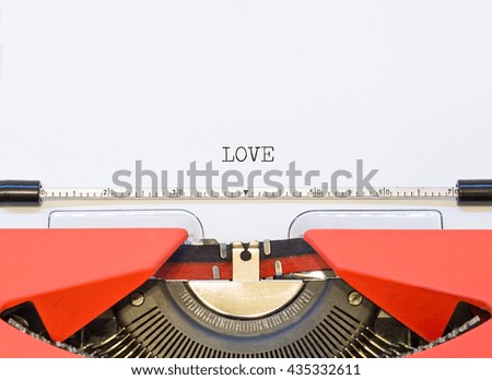 close up image of typewriter with paper sheet and the phrase: LOVE. copy space for your text. retro filtered
