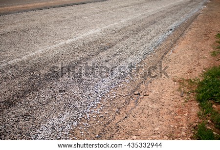 Close-up asphalt at the road under construction.