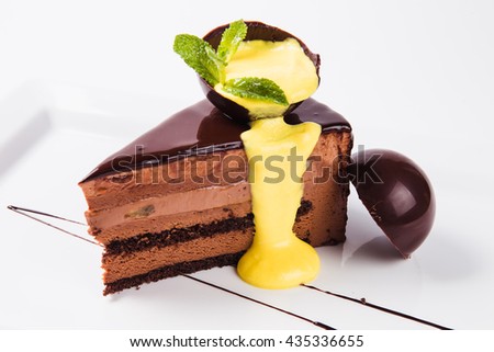 a piece of coffee cake with chocolate (white background)