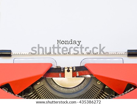 close up image of typewriter with paper sheet and the phrase: Monday. copy space for your text. retro filtered