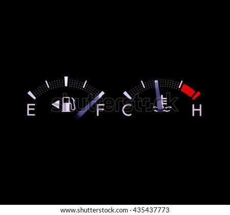 dashboard gasoline indicator in car shows full tank on black background