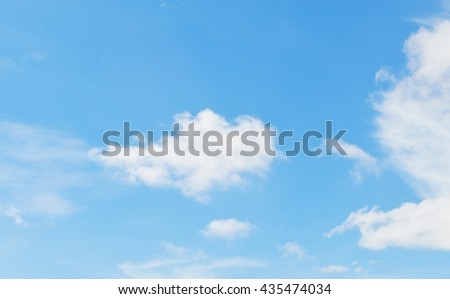 clouds in the blue sky, sky background in pastel tone with copy space