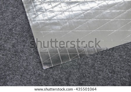 Close up of Reflective aluminium foil texture with reinforcement fiber 3way pattern for heat insulation