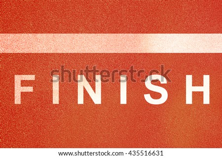 Finish written on running track