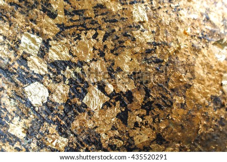 Gild texture background,The gold leaf on the back of Buddha statue in temple of Thailand, 