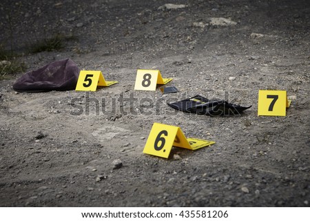 Crime scene investigation - munbering of evidences Royalty-Free Stock Photo #435581206