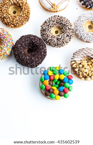 Delicious donuts with icing isolated on white