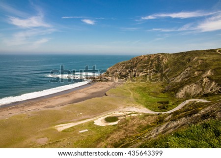 summer holidays travel to spanish atlantic coast of wonderful sandy azkorri beach, basque country, spain