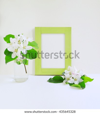 Mock up with green Frame and apple blossom