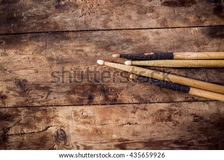 Drum sticks on the wooden background