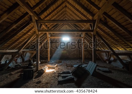 An old spooky attic of a house Royalty-Free Stock Photo #435678424