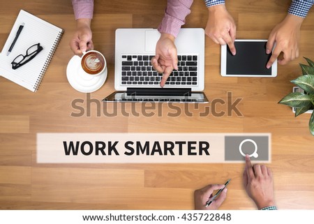 WORK SMARTER man touch bar search and Two Businessman working at office desk and using a digital touch screen tablet and use computer, top view