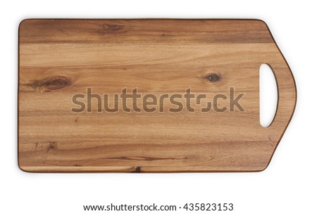 Cutting board made of acacia wood. Close-up, top view. Royalty-Free Stock Photo #435823153