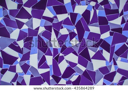Colorful abstract mosaic lined the wall of the building facade. Creates an interesting texture background, it can be used to create your design in graphic editors.Postcards