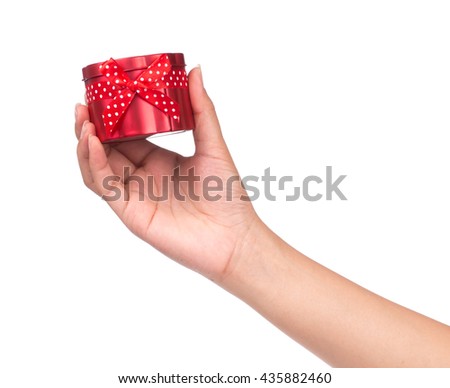 hand holding aluminum red gift box isolated on white background