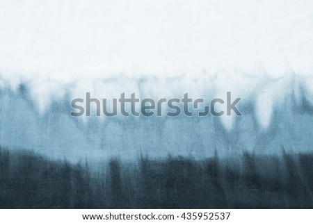 tie dye pattern dip dyed technique on cotton fabric background.

 Royalty-Free Stock Photo #435952537