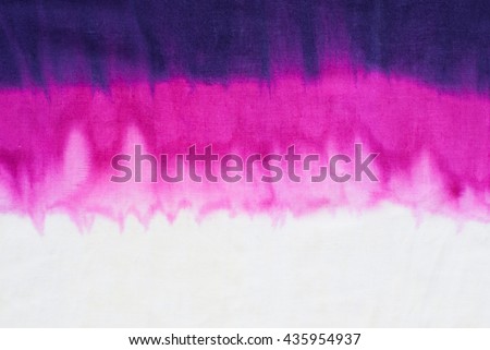 tie dye pattern dip dyed technique on cotton fabric background.

 Royalty-Free Stock Photo #435954937