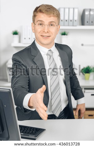 attractive business man in office