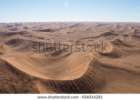 Airwiew of the dunes and sourounding region of the Sossusvlei. Here you find the worlds highes sand dunes. Located in Namib Naukluft Park, Namibia, Africa.