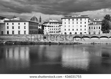 Florence, Italy with river Arno reflection - old town view. Black and white retro photo.
