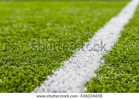 Close up ,Artificial grass with white stripe Royalty-Free Stock Photo #436034698