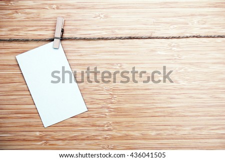 a single piece of white card. rustic mood image filter applied in post processing. 