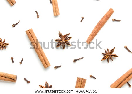 Set of cinnamon, clove and star anise, scattered in a chaotic manner, isolated on white background Royalty-Free Stock Photo #436041955