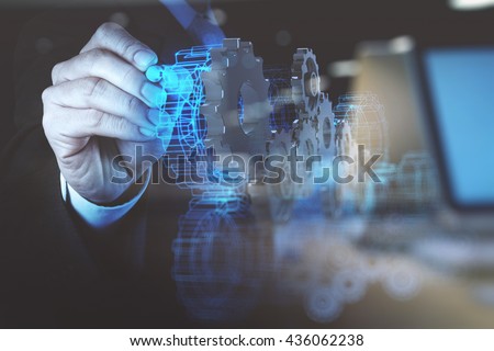 double exposure photo of engineer businessman hand draws gear to success as concept Royalty-Free Stock Photo #436062238