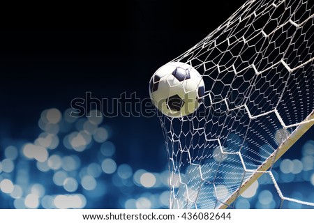 soccer ball in goal Royalty-Free Stock Photo #436082644