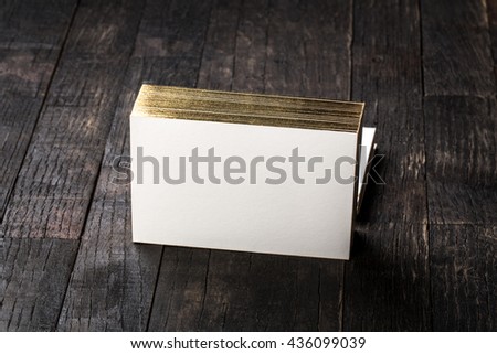 thick white cotton paper business card mock up with foil on the edges