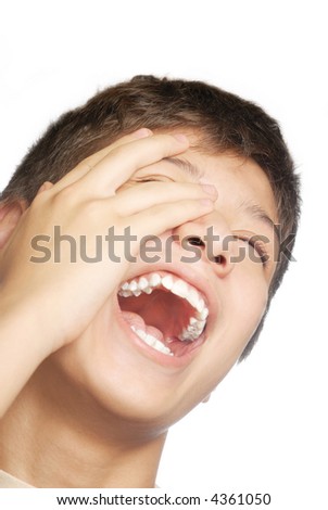 Isolated studio photo of laughing boy on the white background