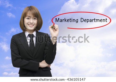 Businesswomen hand writing Marketing Department with black marker on visual screen. Isolated on background. Business, technology, internet concept.