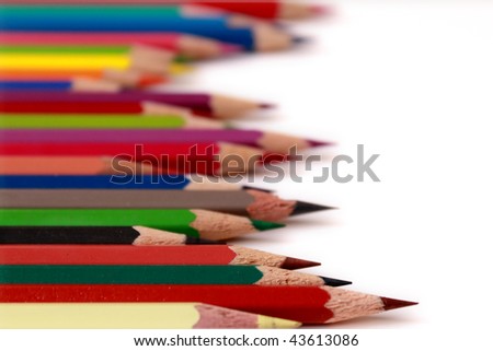 Various colour pencils isolated on white.