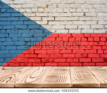 Czech Republic flag painted on brick wall with wooden floor