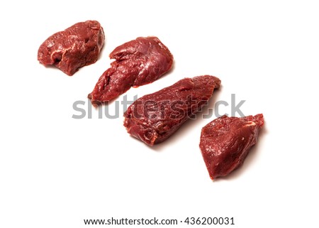 Uncooked kangaroo meat steaks  isolated on a white studio background.