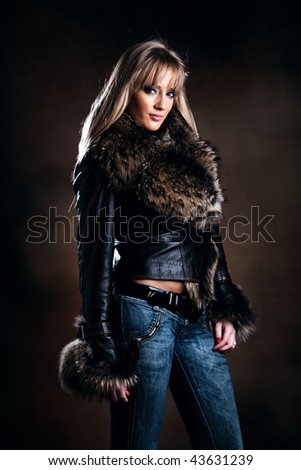 beautiful blond in leather jacket with fur