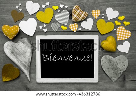 Chalkbord With Many Yellow Hearts, Bienvenue Means Welcome
